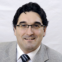 Ivan Tchotourian, Ph.D., Adm.A.